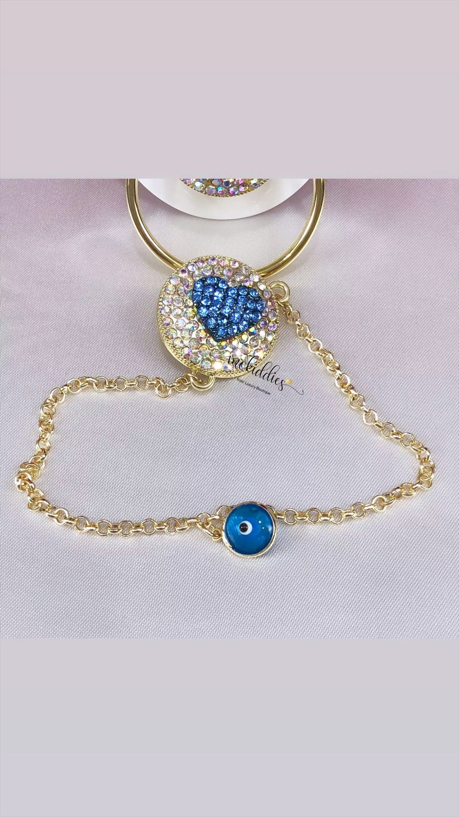 BLINGED HEART WITH EVIL EYE PACIFIER